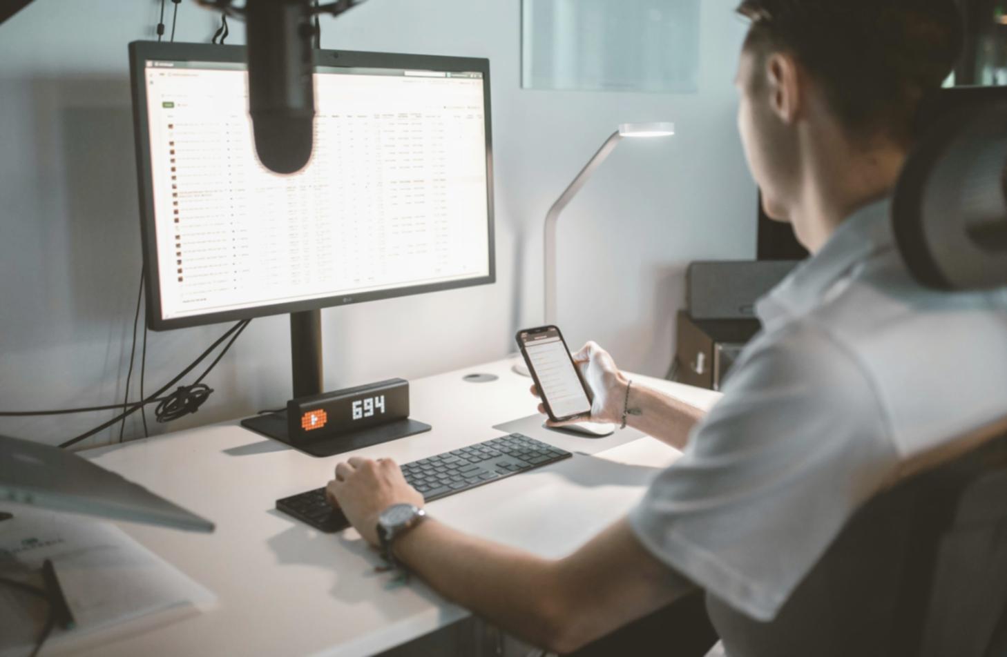 Modern office environment with financial professionals collaborating on market analysis and strategic planning initiatives